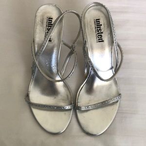 Used 3 inch silver strapy dress heels
